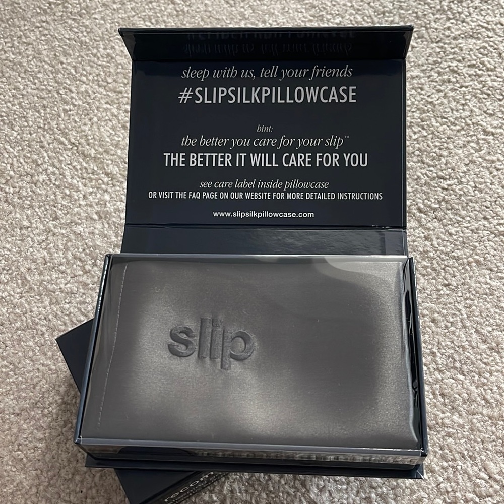 2 never opened or been used slip silk pillow cases in grey